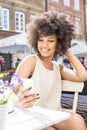 African american girl relaxing at cafe. Royalty Free Stock Photo