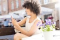 African american girl relaxing at cafe. Royalty Free Stock Photo