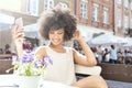 African american girl relaxing at cafe. Royalty Free Stock Photo