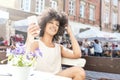 African american girl relaxing at cafe. Royalty Free Stock Photo