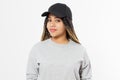 African american girl in template blank sweatshirt and cap isolated on white background. Front pullover and hat view. Copy space Royalty Free Stock Photo