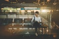 African American girl in waiting hall of airport Royalty Free Stock Photo