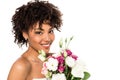 African american girl in wedding dress holding bouquet and looking at camera isolated on white Royalty Free Stock Photo