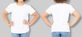 African american girl in white t shirt template and shadow on isolated wall background. Blank t shirt design. Front and back view Royalty Free Stock Photo