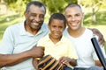 African American Grandfather, Father And Son Playing Baseball In Park Royalty Free Stock Photo