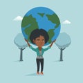 Young african business woman holding globe. Royalty Free Stock Photo