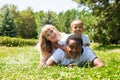 African American happy family: black father, mom and baby boy on nature. Use it for a child, parenting or love concept Royalty Free Stock Photo