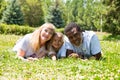 African American happy family: black father, mom and baby boy on nature. Use it for a child, parenting or love concept Royalty Free Stock Photo