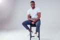 African American healthy male model in a cotton white t-shirt in studio Royalty Free Stock Photo