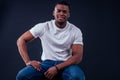 African American healthy male model in a cotton white t-shirt in studio summer lifestyle Royalty Free Stock Photo