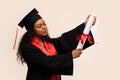 African american woman in graduate dress and mortarboard Royalty Free Stock Photo