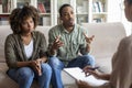 African american husband and wife fighting while visiting psychologist Royalty Free Stock Photo