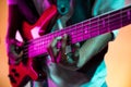 African American jazz musician playing bass guitar. Royalty Free Stock Photo