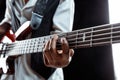 African American jazz musician playing bass guitar. Royalty Free Stock Photo