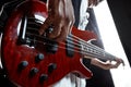 African American jazz musician playing bass guitar. Royalty Free Stock Photo