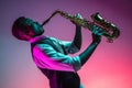 African American jazz musician playing the saxophone. Royalty Free Stock Photo