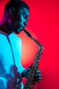 African American jazz musician playing the saxophone. Royalty Free Stock Photo