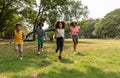 African american kids enjoying and running in the park on summer vacation Royalty Free Stock Photo