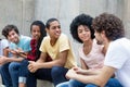 African american and latin young adults talking about politics Royalty Free Stock Photo