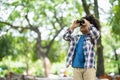 African American little boy with binoculars telescope looking birds in park on on holidays in summer Royalty Free Stock Photo