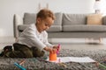 African American Little Boy Drawing Picture With Markers At Home Royalty Free Stock Photo