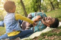 African American little girl with her father in park p Royalty Free Stock Photo