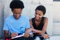 African american male and female student preparing for exam Royalty Free Stock Photo