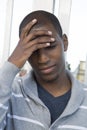 African American male model hand on head thinking or pondering