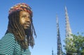 African American male poses with the Watts Towers, 20th Anniversary of the 1965 riots, Los Angeles, California