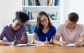 African american male student with nerdy students