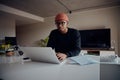 African American male working from home using laptop. Happy African American male working from home. High quality photo Royalty Free Stock Photo