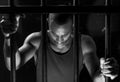 African American man behind bars Royalty Free Stock Photo