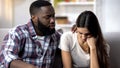 African-American man consoling upset wife, health and life problems, support Royalty Free Stock Photo