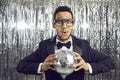 African American man with disco ball in hands Royalty Free Stock Photo