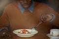 African-American Man Eating Salad