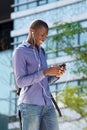 African american man enjoying music on his mobile phone Royalty Free Stock Photo