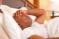 African American man having trouble sleeping. Royalty Free Stock Photo