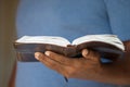 African American man holding the Bible Royalty Free Stock Photo