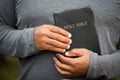 African American man holding a Bible. Royalty Free Stock Photo