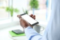 African-American man holding mobile phone Royalty Free Stock Photo