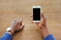 African-American man holding mobile phone Royalty Free Stock Photo