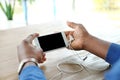 African-American man holding mobile phone Royalty Free Stock Photo