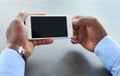 African-American man holding mobile phone Royalty Free Stock Photo