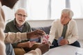 African american man holding playing cards Royalty Free Stock Photo