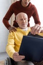 African american man hugging granddad in