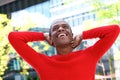 African american man laughing with hands behind head Royalty Free Stock Photo