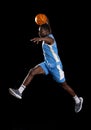 African American man in mid-air basketball action Royalty Free Stock Photo