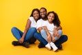 African American man posing with wife and smiling daughter Royalty Free Stock Photo