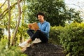 African american man reading book Royalty Free Stock Photo