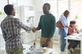 African-American Man Shaking Hands with Coworker Royalty Free Stock Photo